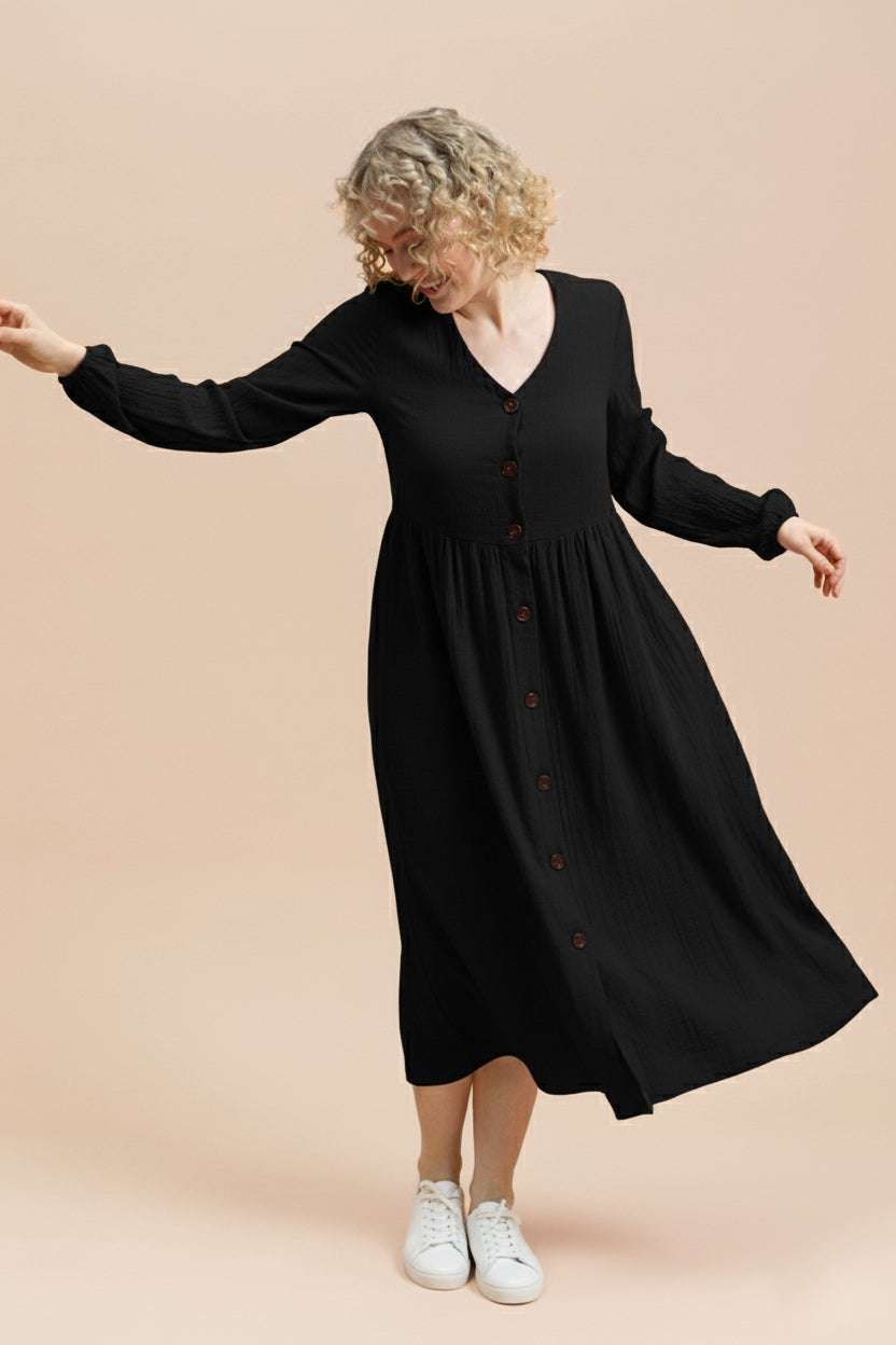 Naisten musta musliininen nappimekko | modelheight:164, size:XS