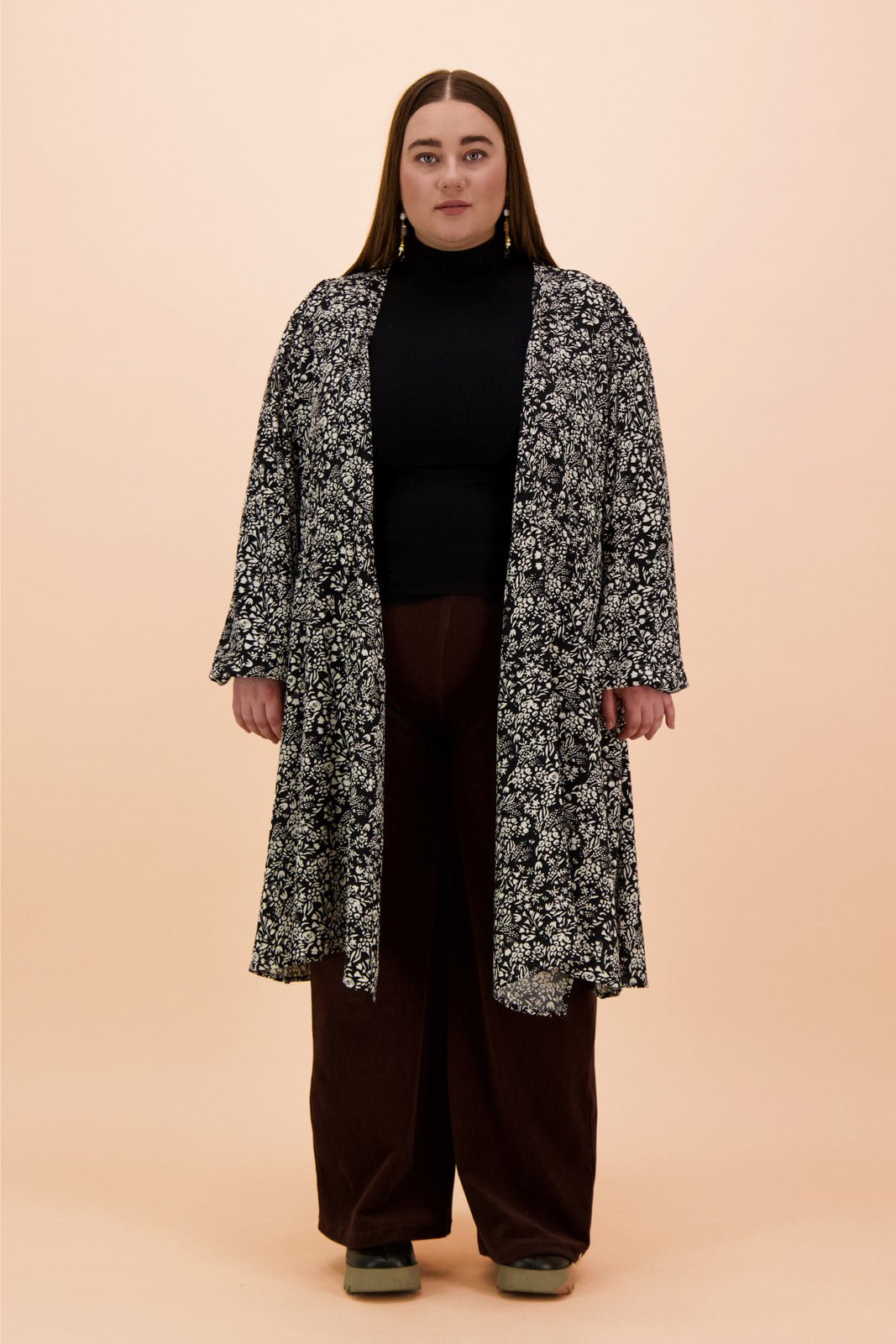 Naisten musta pitkähihainen poolopaita | modelheight:160, size:XL