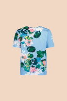 Naisten kukikas t-paita sinisellä pohjalla 